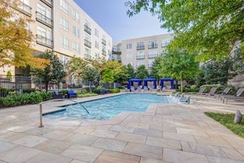 Pool with courtyard and private cabanas